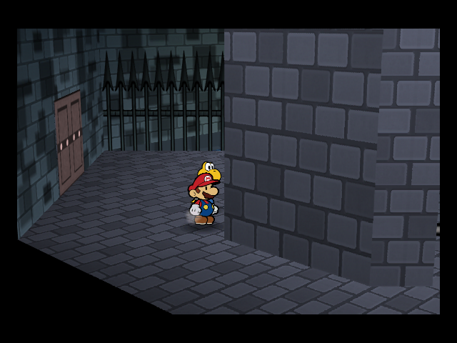 Mario and Goombario stand behind a wall in the fortress prison corridor.